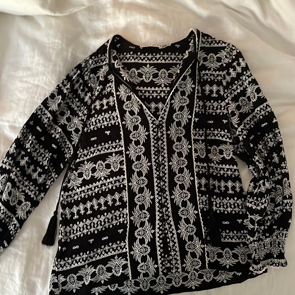 Alice and Olivia black and white eyelet blouse